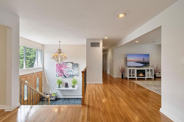 15 Dunmore Rd, New City, NY 10956 - foyer featuring wood finished floors, a chandelier, and recessed lighting