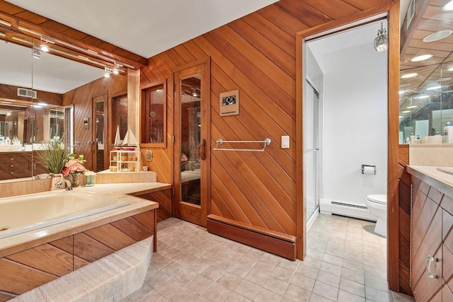 15 Dunmore Rd, New City, NY 10956 - full bath with a baseboard radiator, vanity, wood walls, tile patterned flooring, and a shower stall