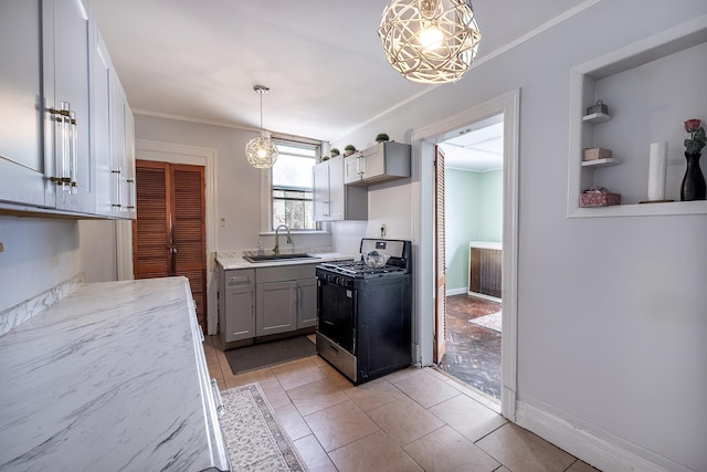 115 Primrose Ave, Mount Vernon, NY 10552 - kitchen with gas stove, gray cabinets, crown molding, decorative light fixtures, and a chandelier