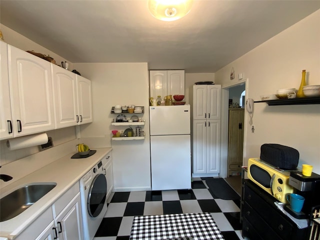 73-19 217th St Unit Nd, Oakland Gardens, NY 11364 - laundry area with washer / dryer and dark flooring