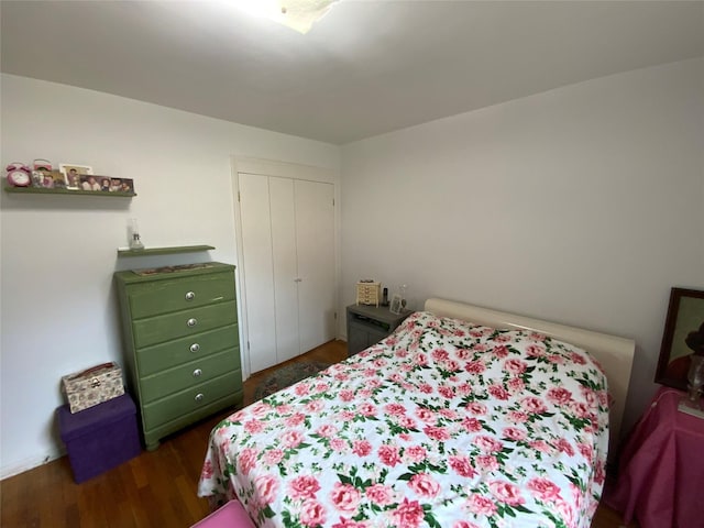 73-19 217th St Unit Nd, Oakland Gardens, NY 11364 - bedroom with wood finished floors and a closet