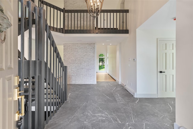 17 Royal Ct, Warwick, NY 10990 - entryway with a high ceiling, marble tiled flooring, a chandelier, and stairway