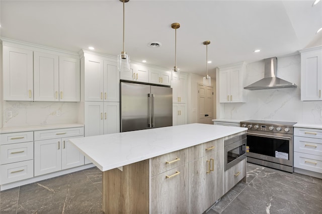 17 Royal Ct, Warwick, NY 10990 - kitchen with stainless steel appliances, wall chimney exhaust hood, decorative backsplash, a kitchen island, and white cabinets