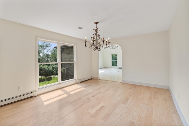 17 Royal Ct, Warwick, NY 10990 - unfurnished room featuring a chandelier, healthy amount of natural light, and wood finished floors