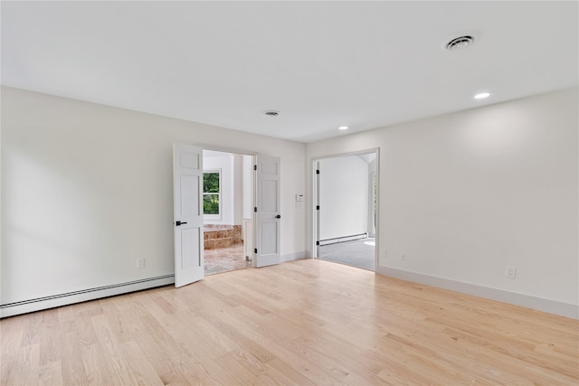 17 Royal Ct, Warwick, NY 10990 - empty room with a baseboard radiator, wood finished floors, and recessed lighting