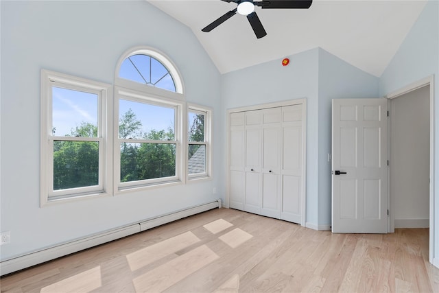 17 Royal Ct, Warwick, NY 10990 - unfurnished bedroom featuring a baseboard radiator, light wood-type flooring, high vaulted ceiling, a closet, and ceiling fan