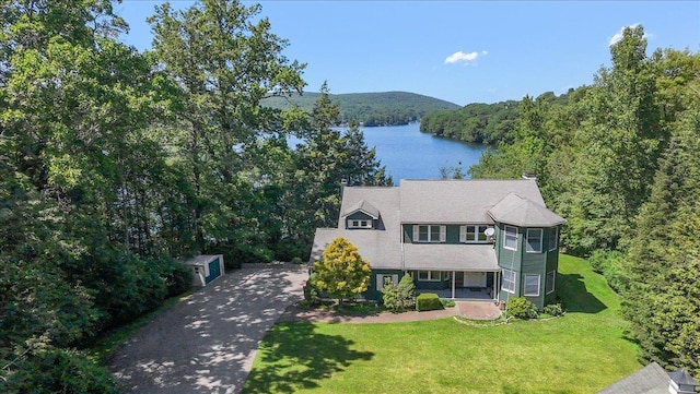 1034 Rte 292, Holmes, NY 12531 - view of front of house featuring a water view, a wooded view, a front lawn, and driveway
