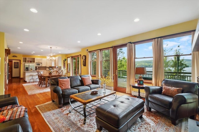 1034 Rte 292, Holmes, NY 12531 - living room with a chandelier, recessed lighting, and wood finished floors
