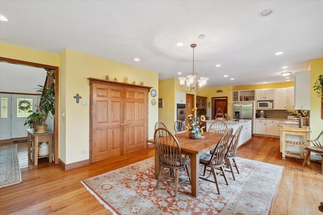 1034 Rte 292, Holmes, NY 12531 - dining space featuring light wood-style floors, recessed lighting, and a chandelier