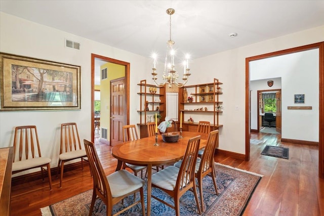 1034 Rte 292, Holmes, NY 12531 - dining area with wood finished floors and a chandelier