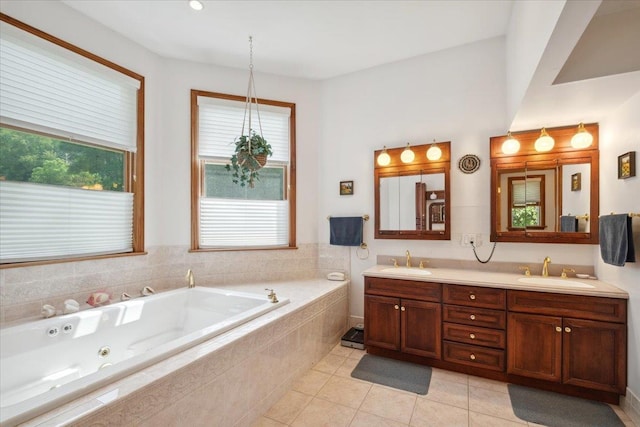 1034 Rte 292, Holmes, NY 12531 - bathroom featuring double vanity, a jetted tub, and tile patterned floors