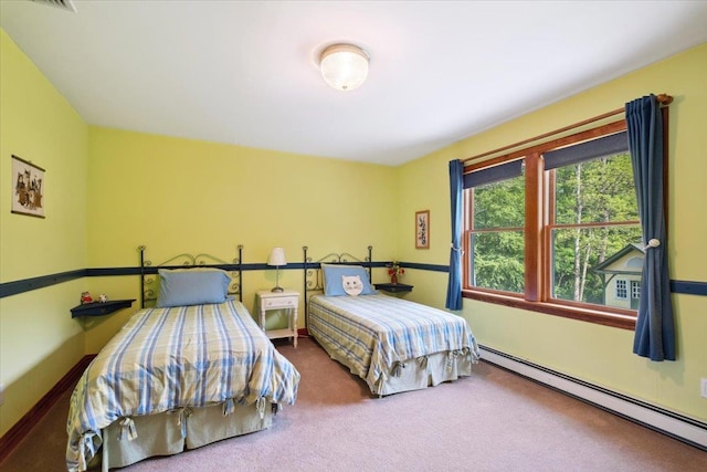 1034 Rte 292, Holmes, NY 12531 - bedroom featuring a baseboard heating unit and carpet floors