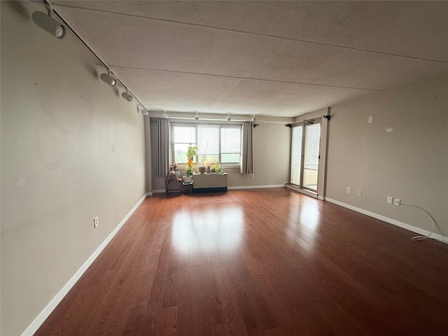 701 Pelham Rd Unit 2E, New Rochelle, NY 10805 - empty room with wood finished floors and baseboards