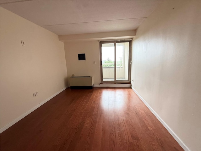 701 Pelham Rd Unit 2E, New Rochelle, NY 10805 - unfurnished room featuring radiator and wood finished floors