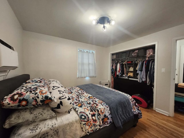 64-15 Springfield Blvd Unit A, Oakland Gardens, NY 11364 - bedroom with wood finished floors, a closet, and baseboards