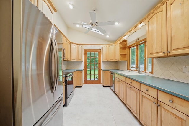99 Furnace Dock Rd, Croton-On-Hudson, NY 10520 - kitchen featuring appliances with stainless steel finishes, a sink, light brown cabinets, lofted ceiling, and backsplash