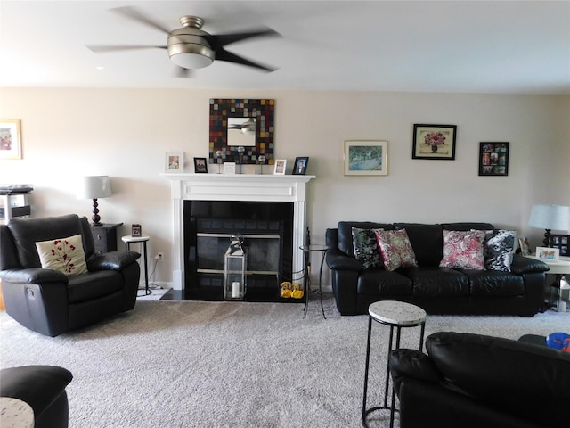 133 Lattintown Rd, Newburgh, NY 12550 - living room featuring carpet floors, a ceiling fan, and a fireplace with flush hearth