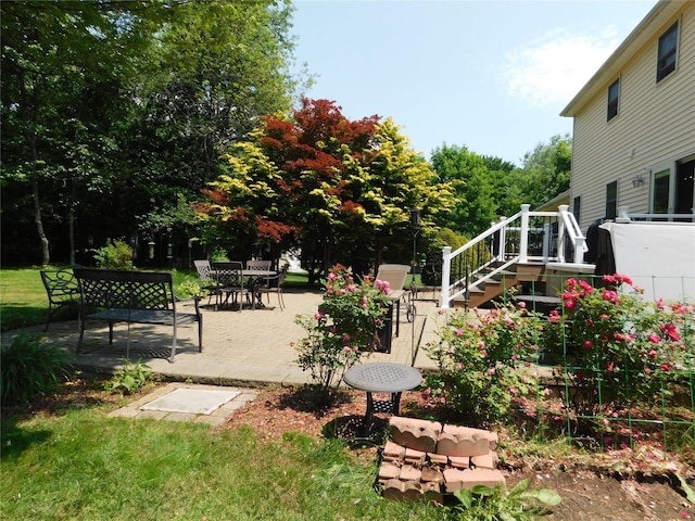 133 Lattintown Rd, Newburgh, NY 12550 - view of green lawn with stairs and a patio area