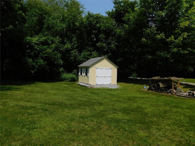 133 Lattintown Rd, Newburgh, NY 12550 - view of green lawn with a shed and a view of trees