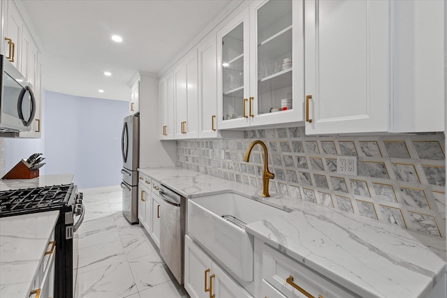 83-30 98th St Unit 5A, Woodhaven, NY 11421 - kitchen featuring appliances with stainless steel finishes, white cabinets, recessed lighting, light marble finish floors, and a sink