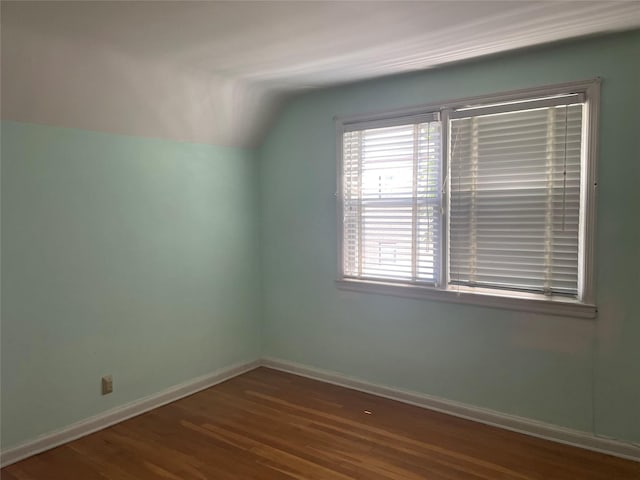 4 New Hyde Park Rd, New Hyde Park, NY 11040 - additional living space with lofted ceiling and wood finished floors