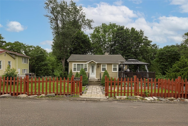 33 Hollowbrook Ct N, Cortlandt Manor, NY 10567 - view of front of house with a gazebo and a fenced front yard