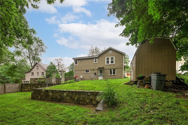 33 Hollowbrook Ct N, Cortlandt Manor, NY 10567 - rear view of property with a storage shed and a chimney