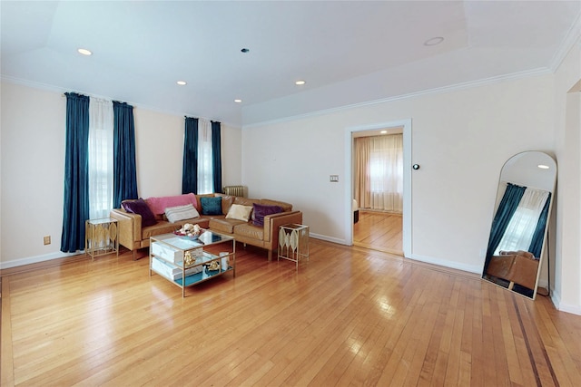 33 Hollowbrook Ct N, Cortlandt Manor, NY 10567 - living area featuring light wood finished floors, crown molding, and healthy amount of natural light