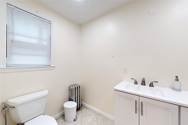 33 Hollowbrook Ct N, Cortlandt Manor, NY 10567 - bathroom featuring radiator heating unit, vanity, and tile patterned floors
