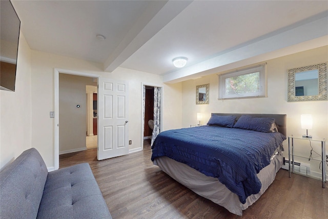 33 Hollowbrook Ct N, Cortlandt Manor, NY 10567 - bedroom featuring wood finished floors and beamed ceiling