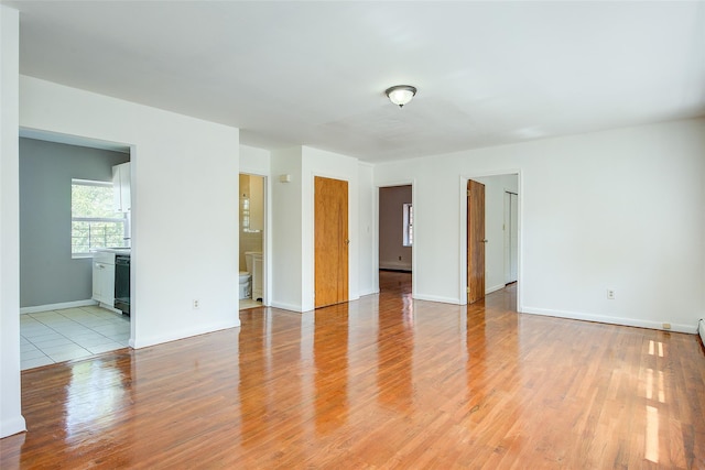 39-32 54th St, Woodside, NY 11377 - unfurnished room with light wood-type flooring and baseboards