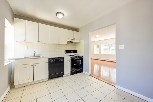 39-32 54th St, Woodside, NY 11377 - kitchen with dishwasher, gas range, under cabinet range hood, a sink, and light countertops