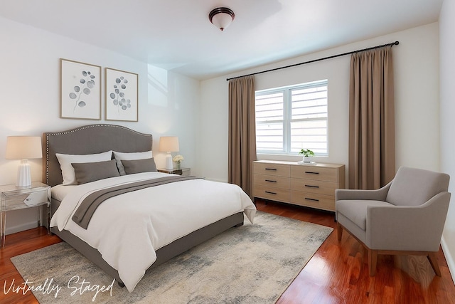 39-32 54th St, Woodside, NY 11377 - bedroom featuring dark wood finished floors