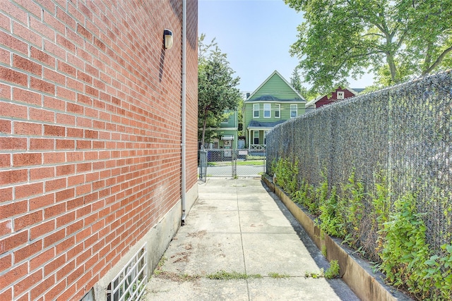 39-32 54th St, Woodside, NY 11377 - view of side of home with brick siding