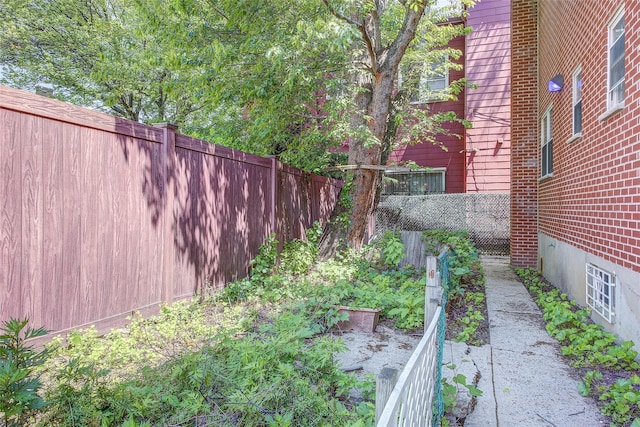 39-32 54th St, Woodside, NY 11377 - fenced yard with a garden