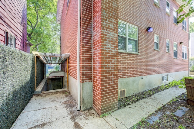 39-32 54th St, Woodside, NY 11377 - view of side of home with brick siding