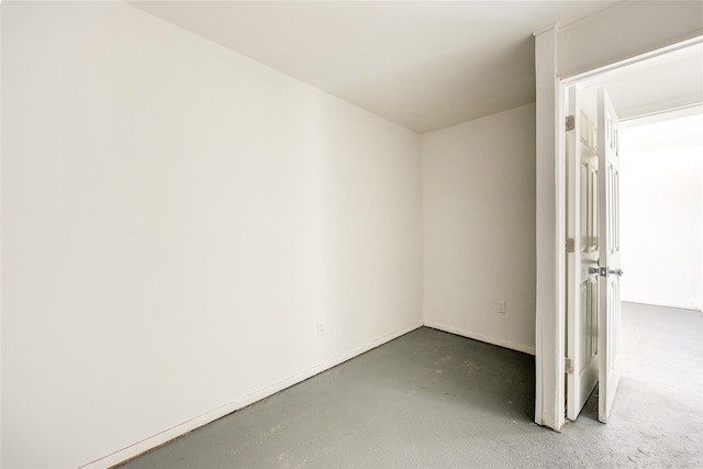 39-32 54th St, Woodside, NY 11377 - empty room featuring finished concrete floors