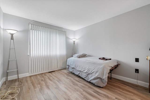 615 Broadway Unit 85, Amityville, NY 11701 - bedroom featuring wood finished floors