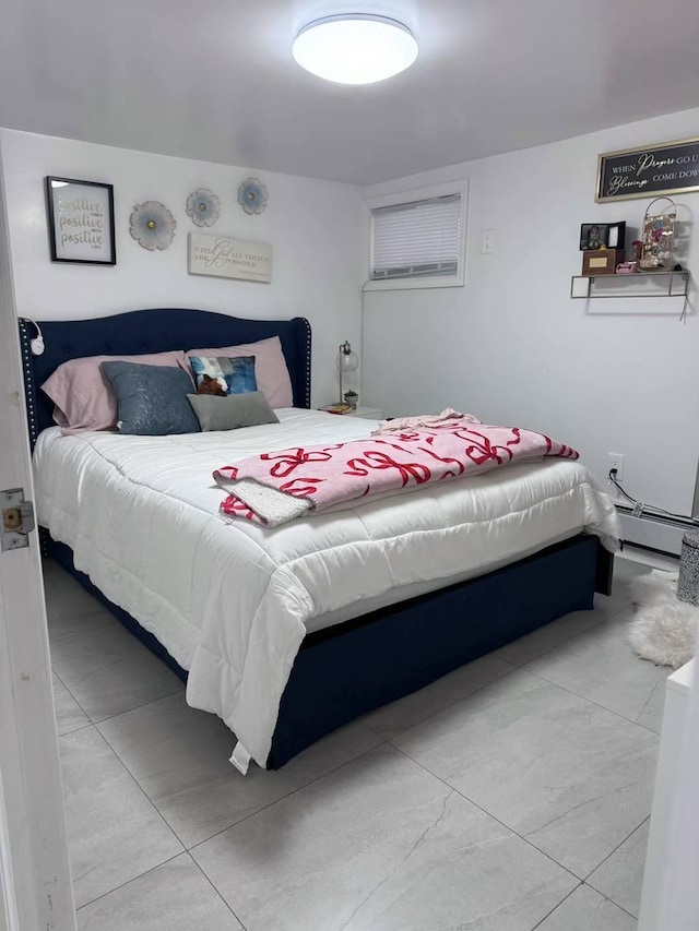 125-03 13th Ave, College Point, NY 11356 - bedroom with a baseboard radiator