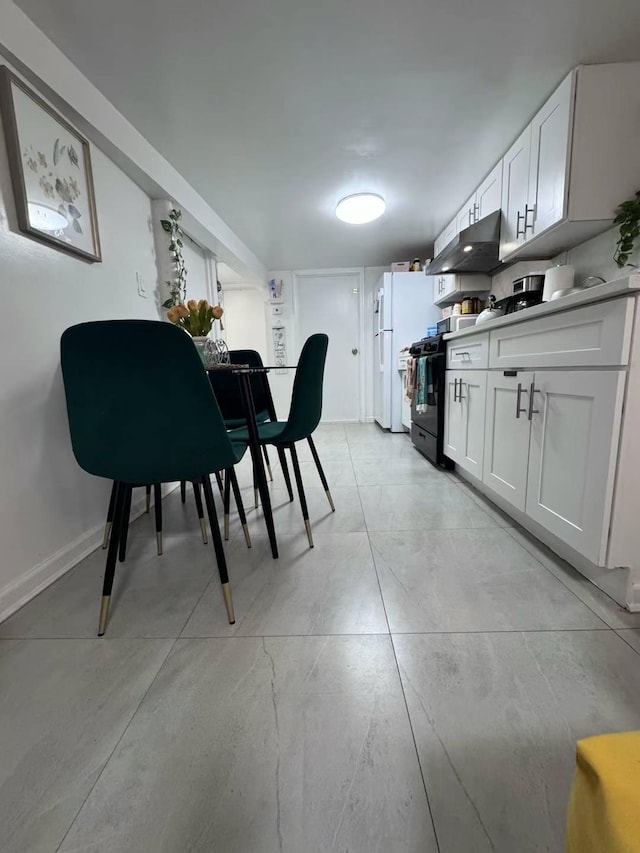 125-03 13th Ave, College Point, NY 11356 - dining area featuring baseboards