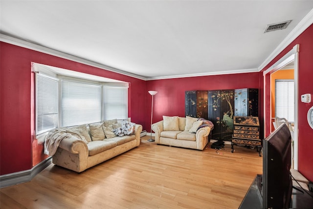 10 Marlan Ct, Smithtown, NY 11787 - living room featuring wood finished floors, crown molding, and baseboard heating