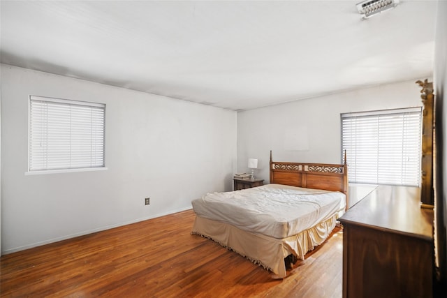 10 Marlan Ct, Smithtown, NY 11787 - bedroom with wood finished floors and baseboards