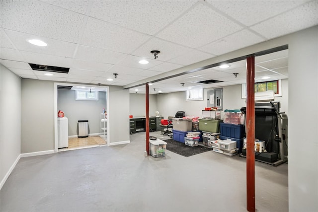 10 Marlan Ct, Smithtown, NY 11787 - basement with washer / clothes dryer, a paneled ceiling, and recessed lighting