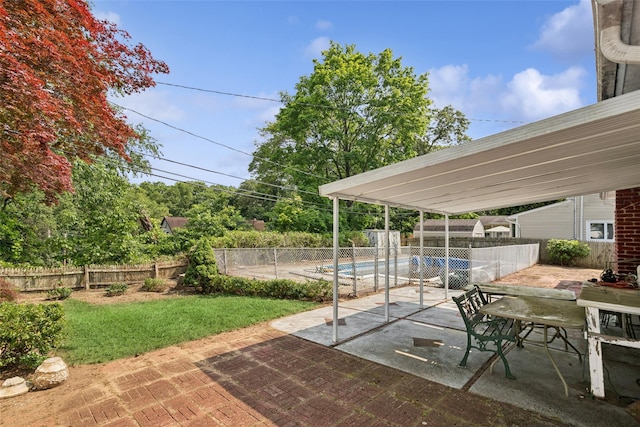 10 Marlan Ct, Smithtown, NY 11787 - fenced backyard with a patio and outdoor dining area