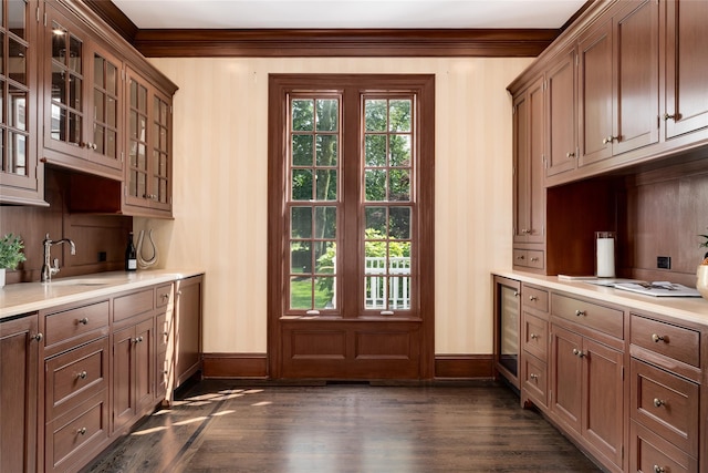 21 Dorann Rd, Purchase, NY 10577 - kitchen featuring dark wood finished floors, light countertops, glass insert cabinets, wine cooler, and ornamental molding
