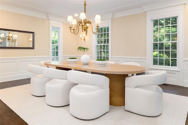21 Dorann Rd, Purchase, NY 10577 - dining room featuring a chandelier, a decorative wall, ornamental molding, wood finished floors, and a wainscoted wall