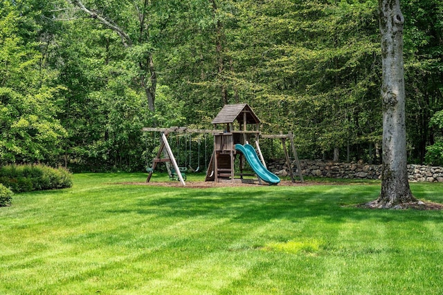 21 Dorann Rd, Purchase, NY 10577 - view of playground featuring a yard and a wooded view