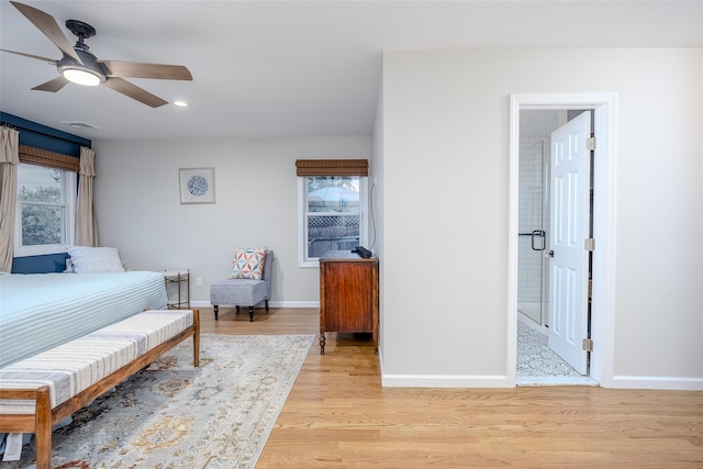 10 Bradish Ln, Babylon, NY 11702 - bedroom with light wood finished floors, recessed lighting, ensuite bathroom, and a ceiling fan