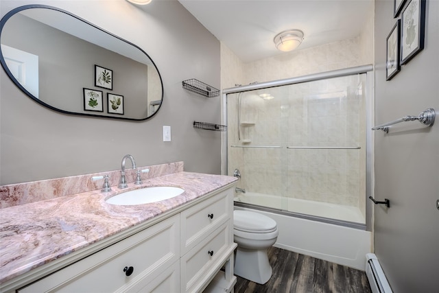 10 Bradish Ln, Babylon, NY 11702 - full bathroom featuring vanity, wood finished floors, enclosed tub / shower combo, and baseboard heating