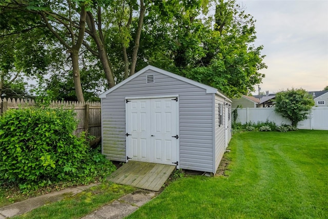 10 Bradish Ln, Babylon, NY 11702 - view of shed with a fenced backyard